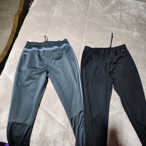 Adidas soccer pants and Nike running pants.